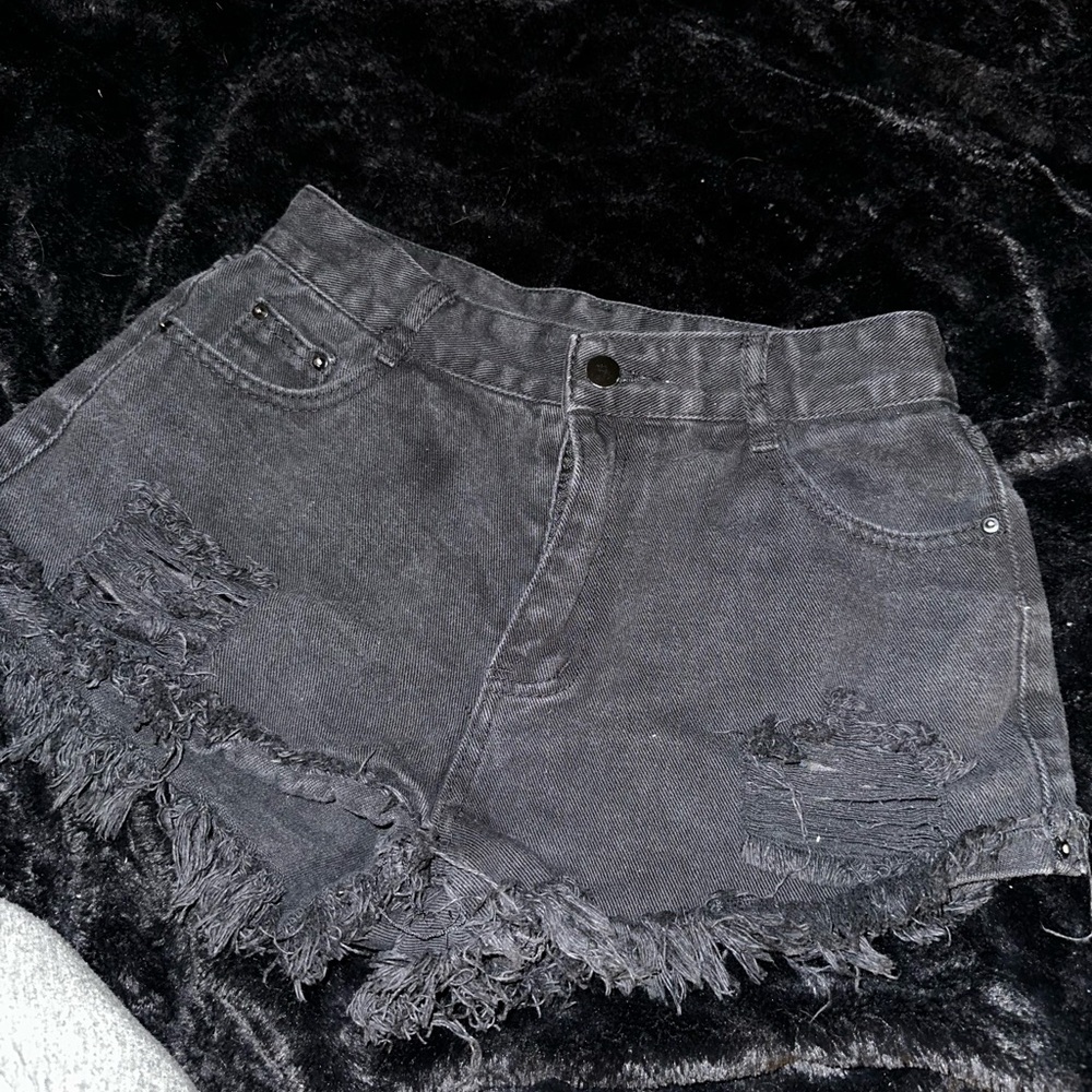 Black high waisted shorts with frayed hems